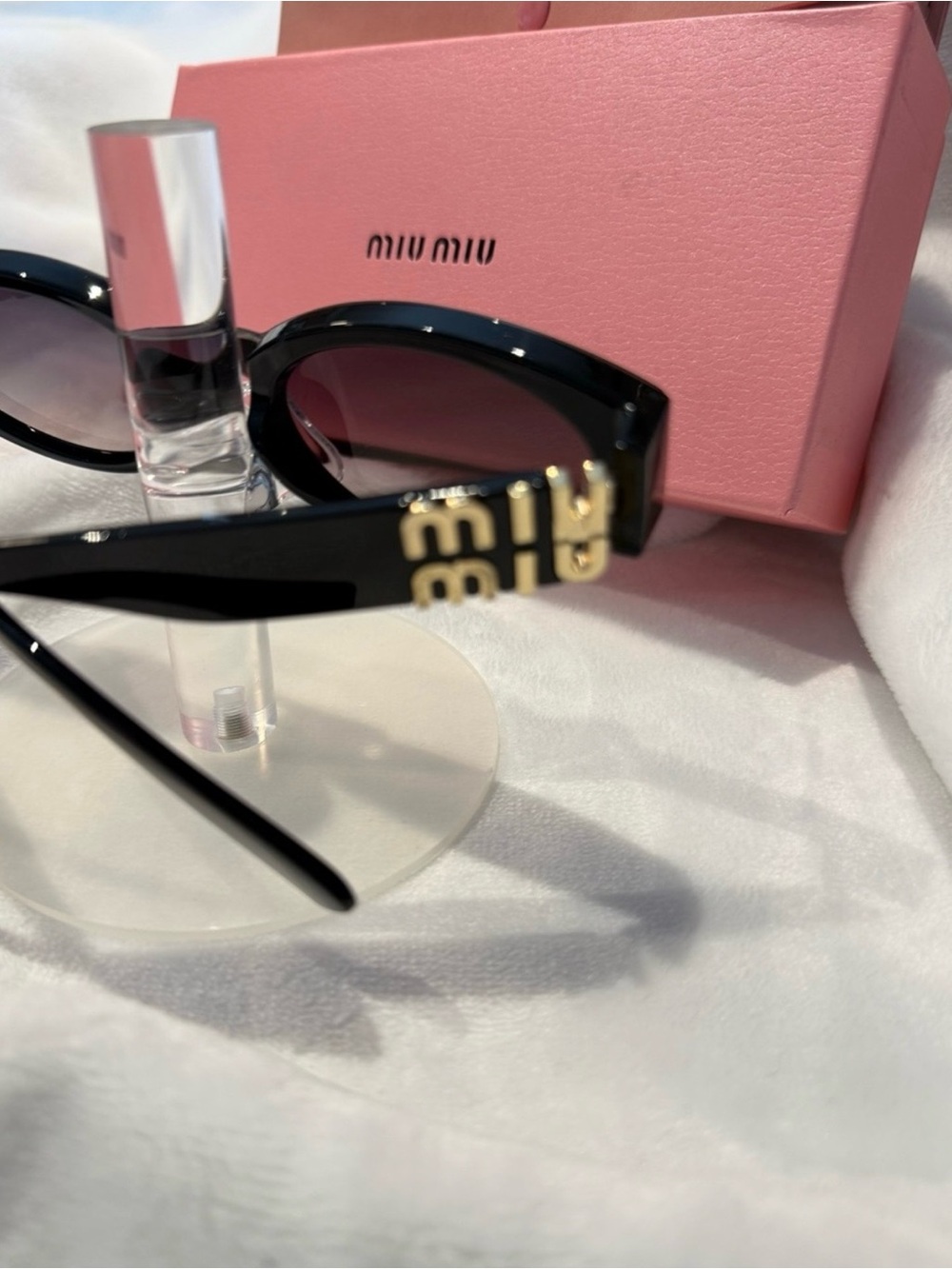 Miu Miu Black Sunglasses with Gold Logo Accent